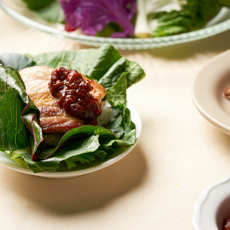 Lettuce wrap with grilled pork topped with ssamjang